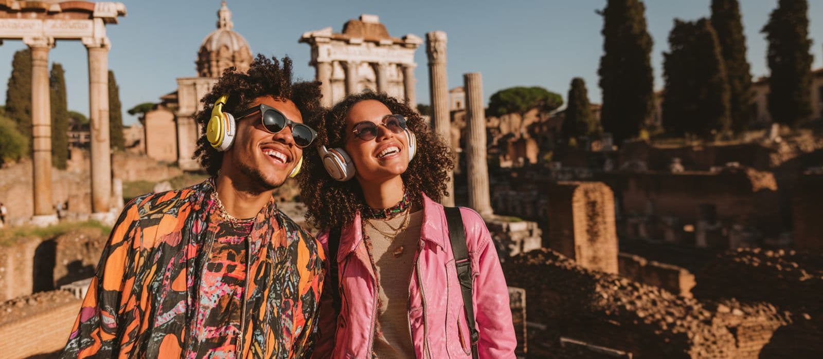 Couple exploring Roman ruins with a personal Roam guide